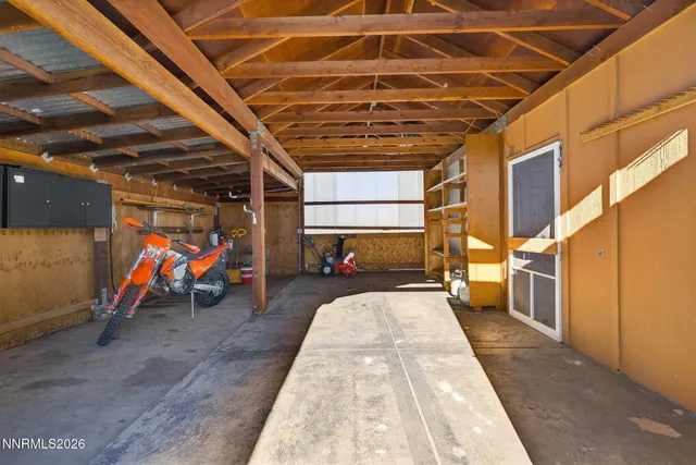 a view of hallway with wooden walls