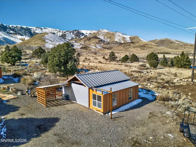 a view of a lake with mountains in the background