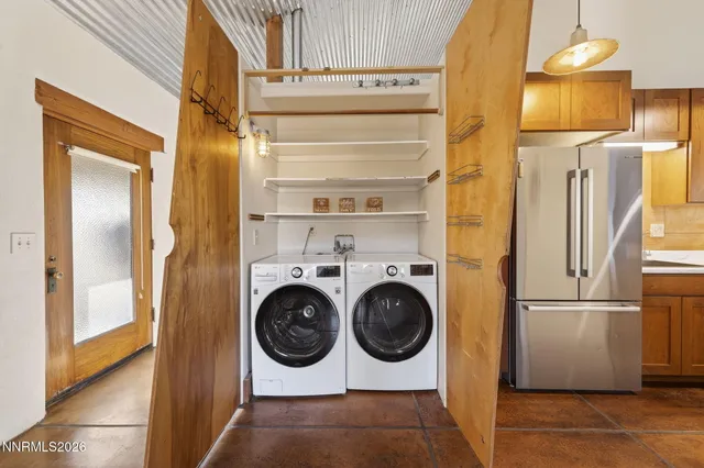 a utility room with dryer and washer