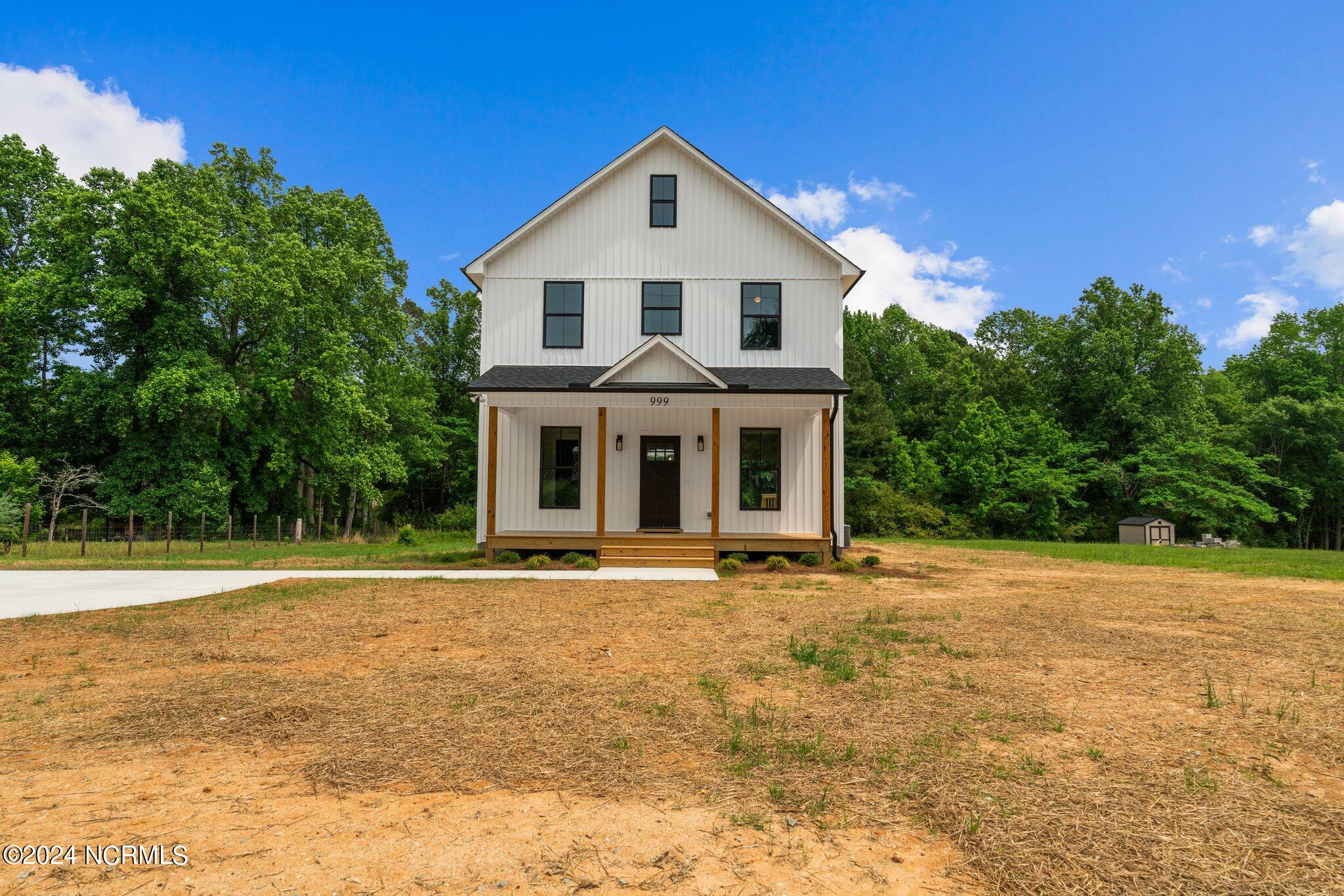 999 Thompson Road Four Oaks, NC 27524 - Photo 1 of 32 1-web-or-mls-DSC01204