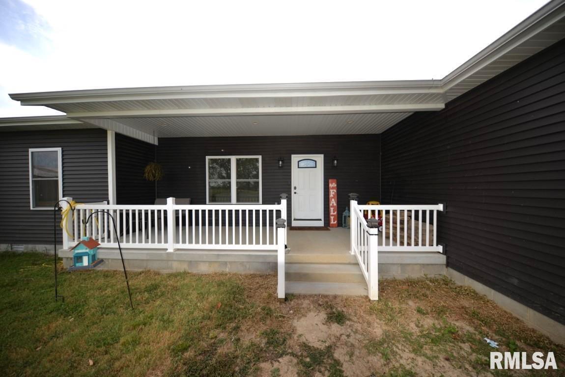 17359 Log Cabin Road Ewing, IL 62836 - Photo 1 of 38 a porch with a bench