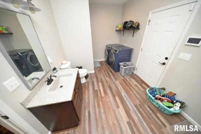 a bedroom with a bed and a walk in closet