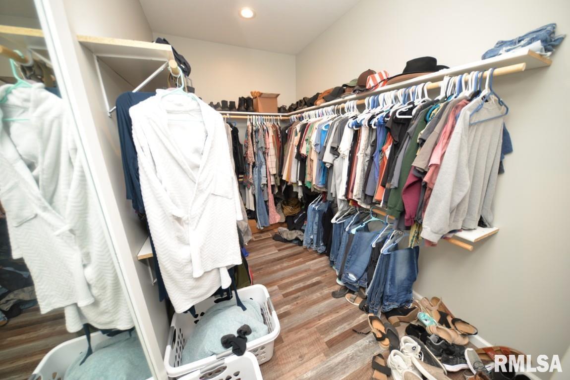 17359 Log Cabin Road Ewing, IL 62836 - Photo 26 of 38 a view of walk in closet with clothes and shoes