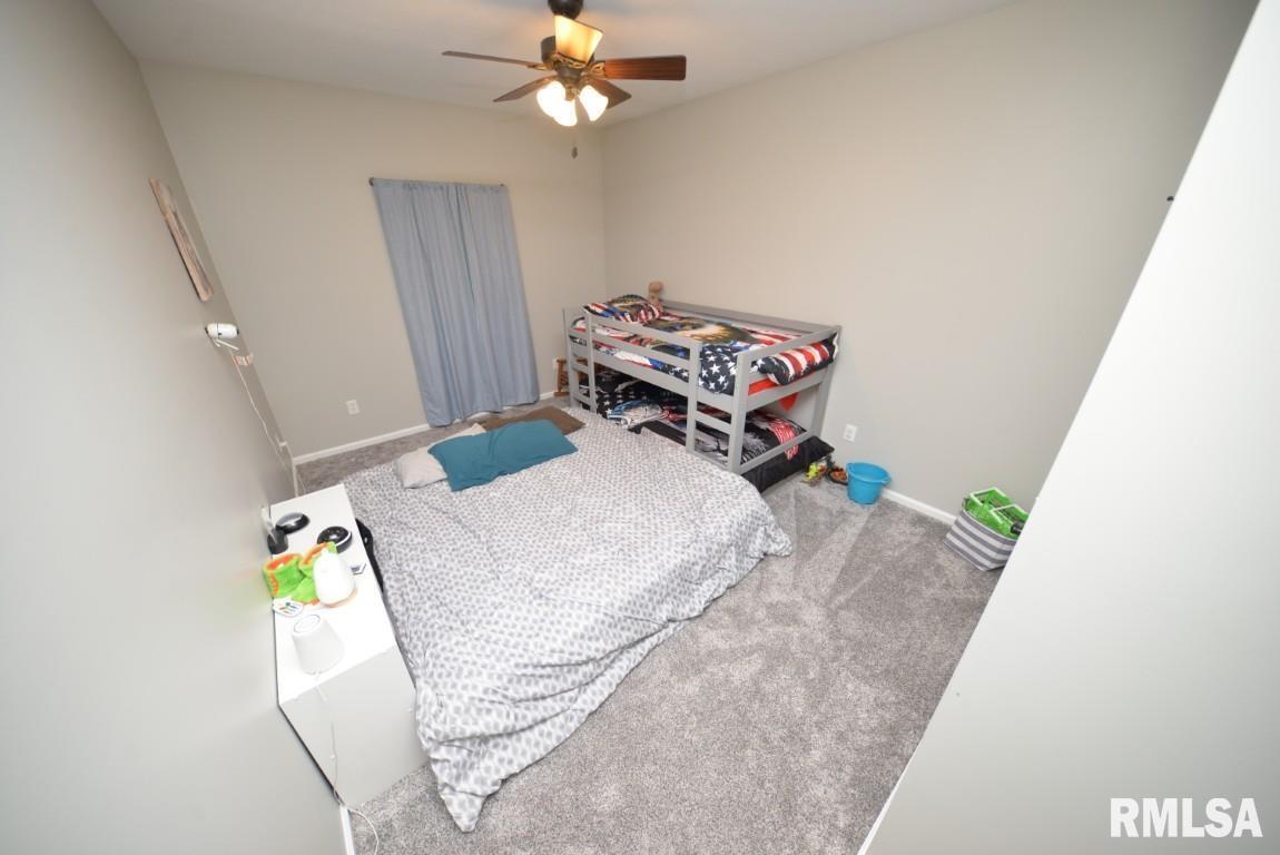 17359 Log Cabin Road Ewing, IL 62836 - Photo 30 of 38 a bed room with a bed