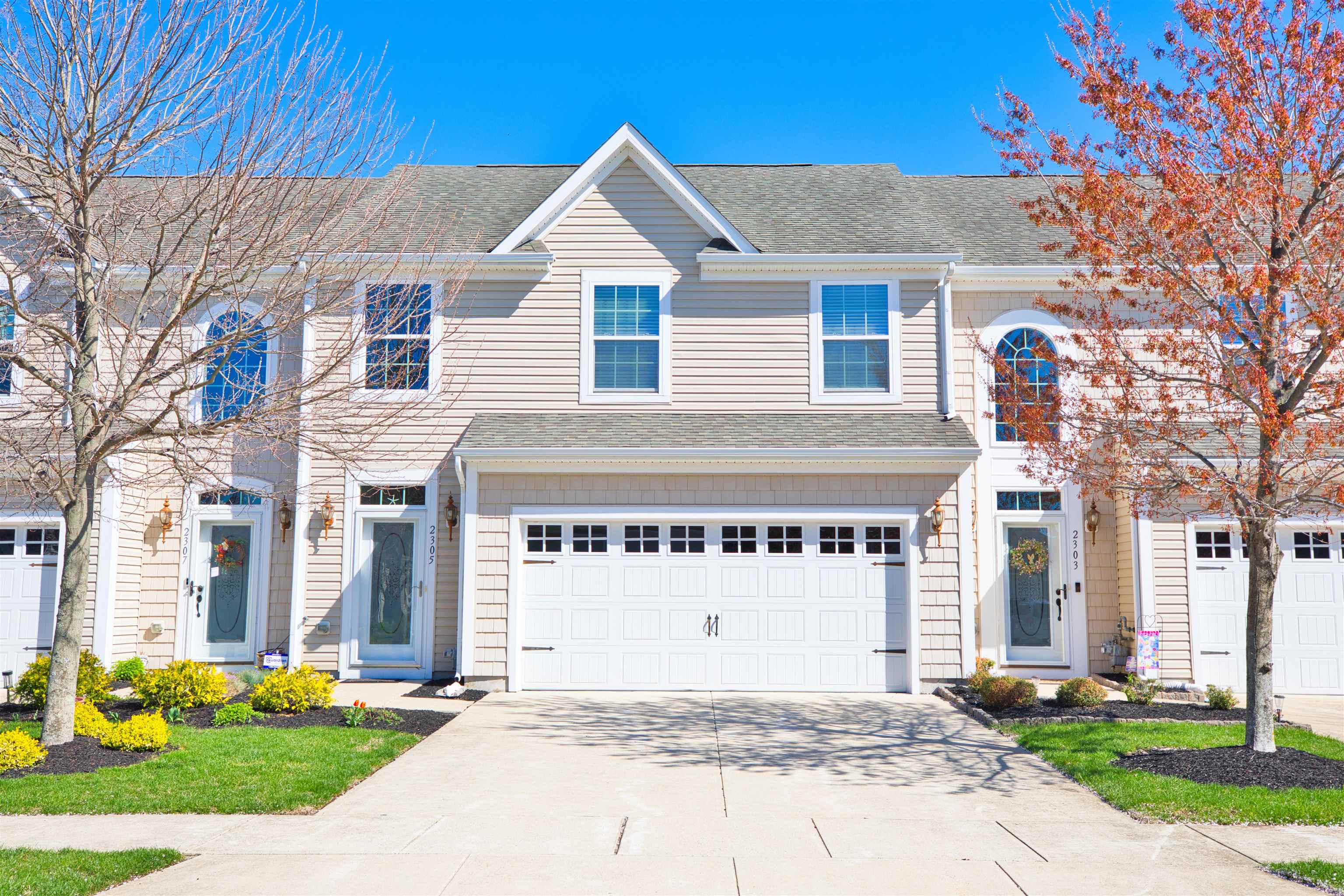2305 Tidewater Avenue, Unit 2305 Rio Grande, NJ 08242 - Photo 1 of 23 a view of a house with a yard and garage