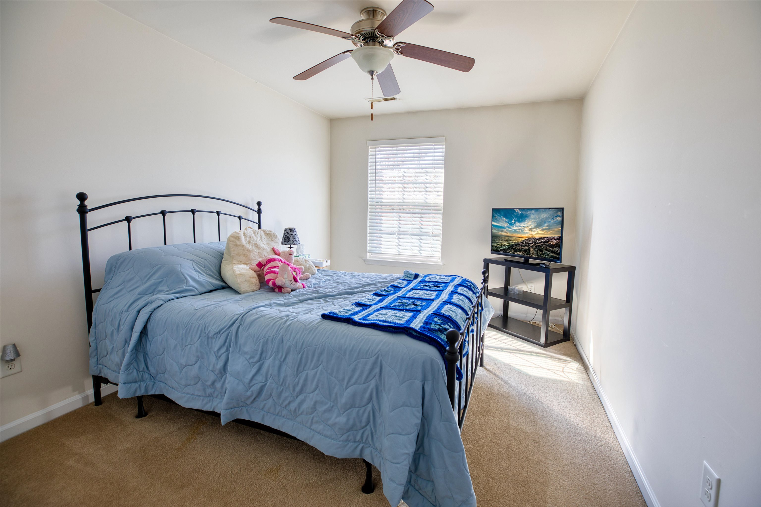 2305 Tidewater Avenue, Unit 2305 Rio Grande, NJ 08242 - Photo 19 of 23 a bedroom with a bed and window