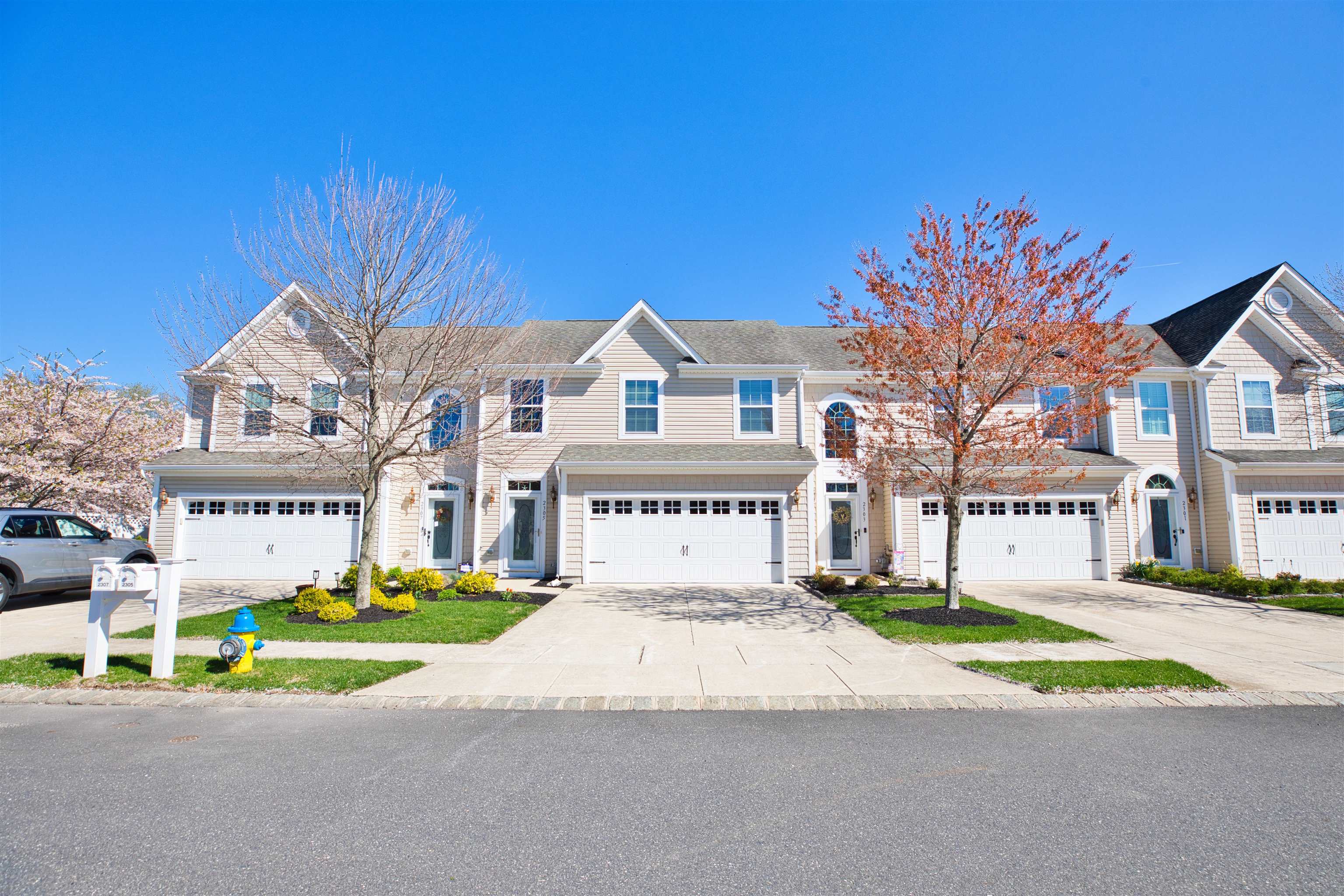 2305 Tidewater Avenue, Unit 2305 Rio Grande, NJ 08242 - Photo 2 of 23 a view of road with card and yard