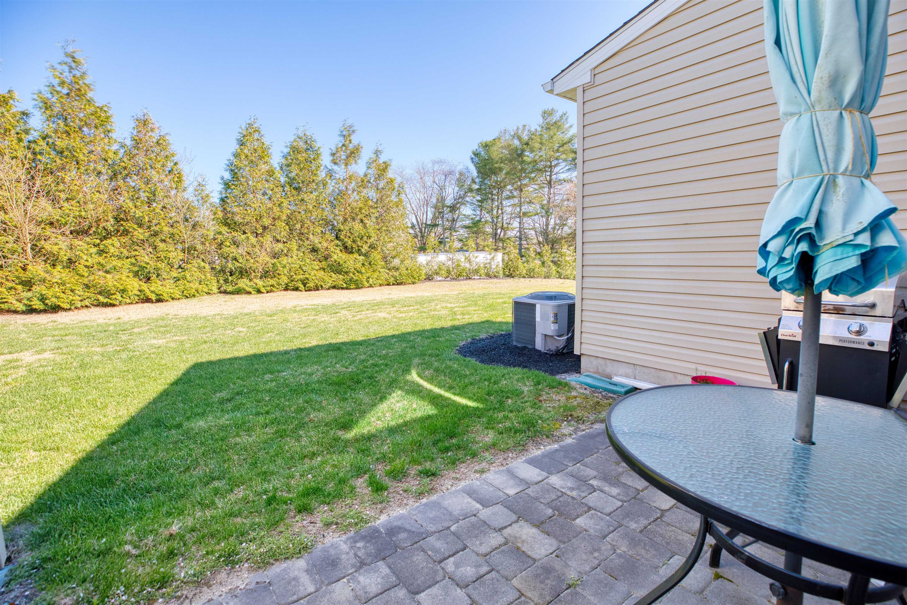 2305 Tidewater Avenue, Unit 2305 Rio Grande, NJ 08242 - Photo 21 of 23 a view of a backyard with plants and patio