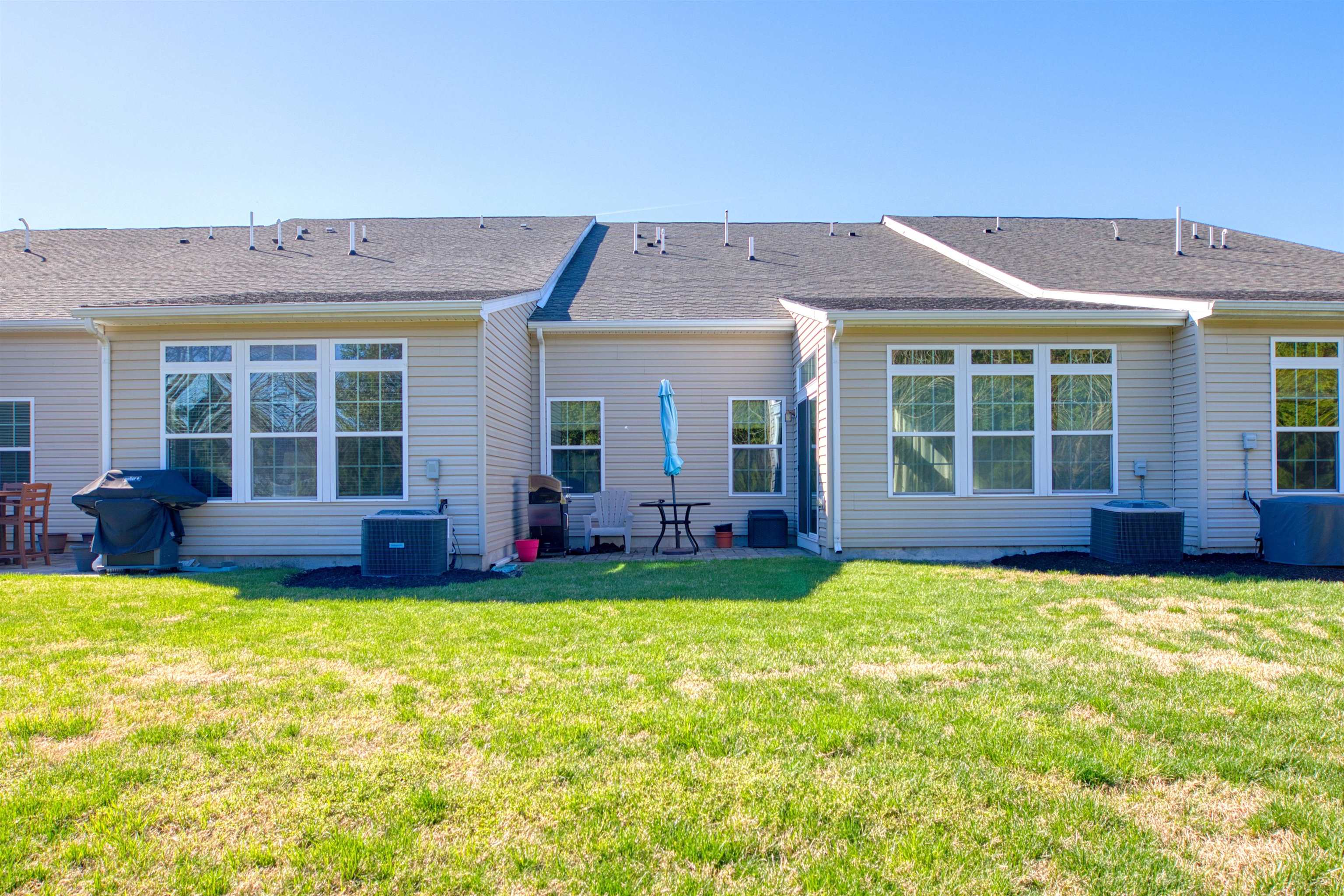 2305 Tidewater Avenue, Unit 2305 Rio Grande, NJ 08242 - Photo 23 of 23 a view of a house with swimming pool and a yard