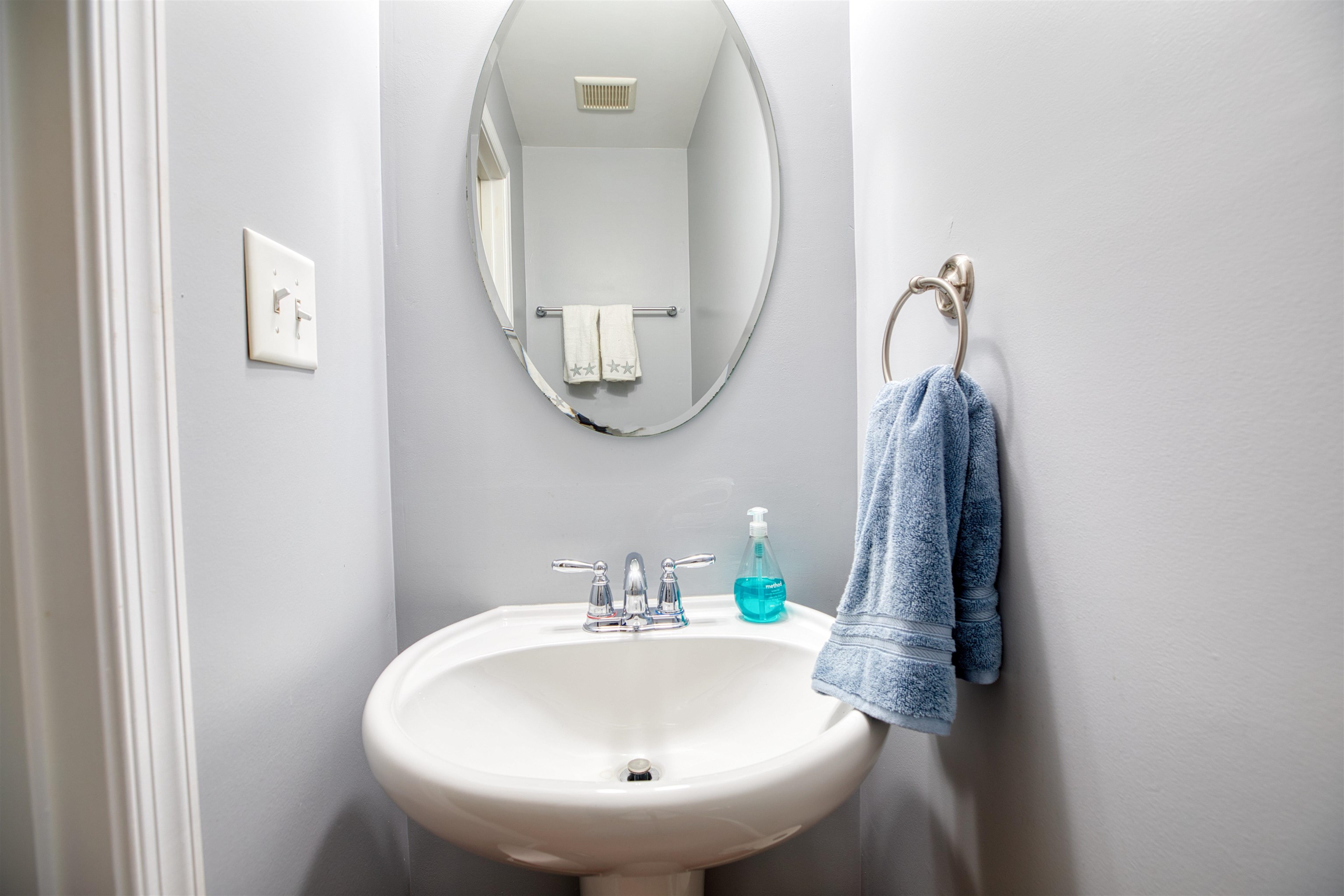 2305 Tidewater Avenue, Unit 2305 Rio Grande, NJ 08242 - Photo 9 of 23 a bathroom with a sink and mirror