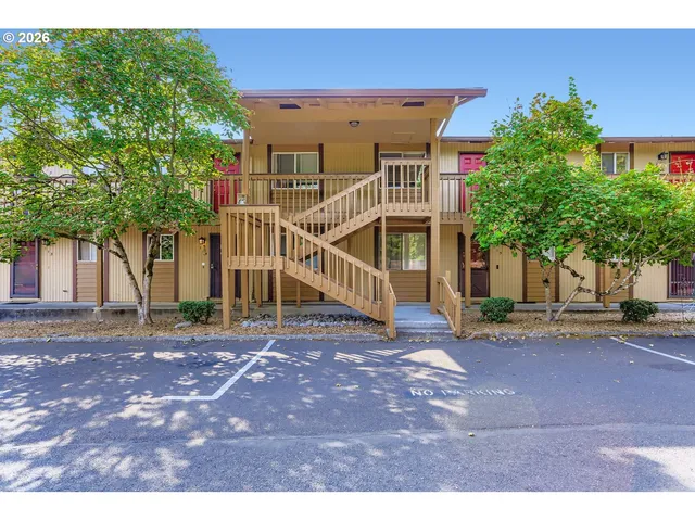 a view of a house with a street