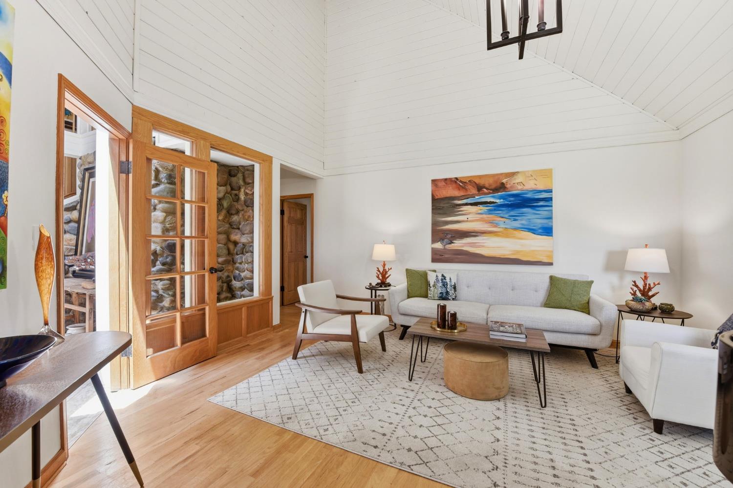 7201 Happy Valley Road Somerset, CA 95684 - Photo 22 of 75 The open walls and glass front door allows tons of natural light into the living space.