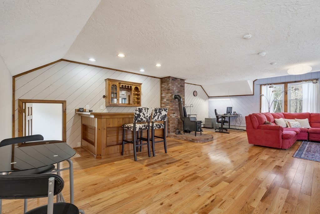 430 River Road Andover, MA 01810 - Photo 20 of 25 a living room with furniture and wooden floor
