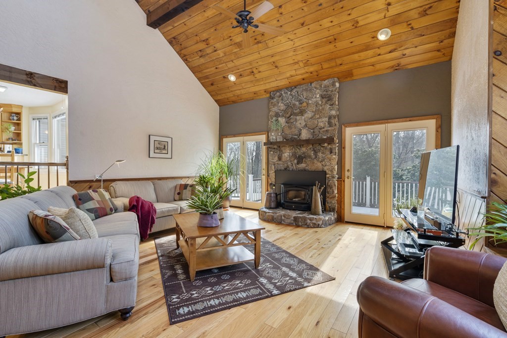 430 River Road Andover, MA 01810 - Photo 2 of 25 a living room with furniture fireplace and a fireplace