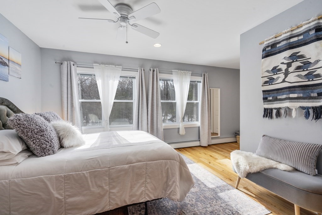 430 River Road Andover, MA 01810 - Photo 21 of 25 a bedroom with a large bed and a window