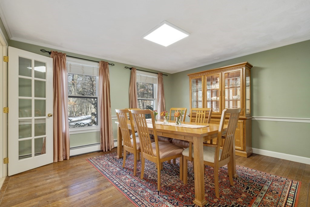 430 River Road Andover, MA 01810 - Photo 8 of 25 a view of a dining room with furniture window and wooden floor
