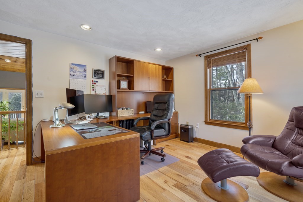 430 River Road Andover, MA 01810 - Photo 9 of 25 a workspace with furniture and window