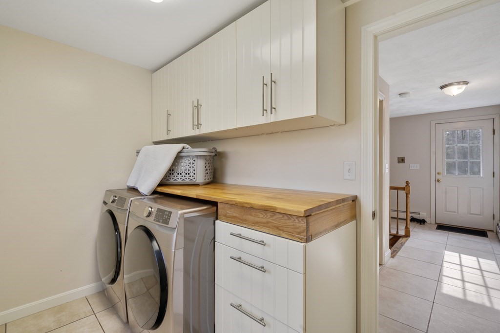 430 River Road Andover, MA 01810 - Photo 10 of 25 a utility room with dryer and washer