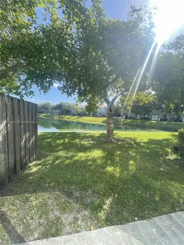 a view of a garden with an outdoor space