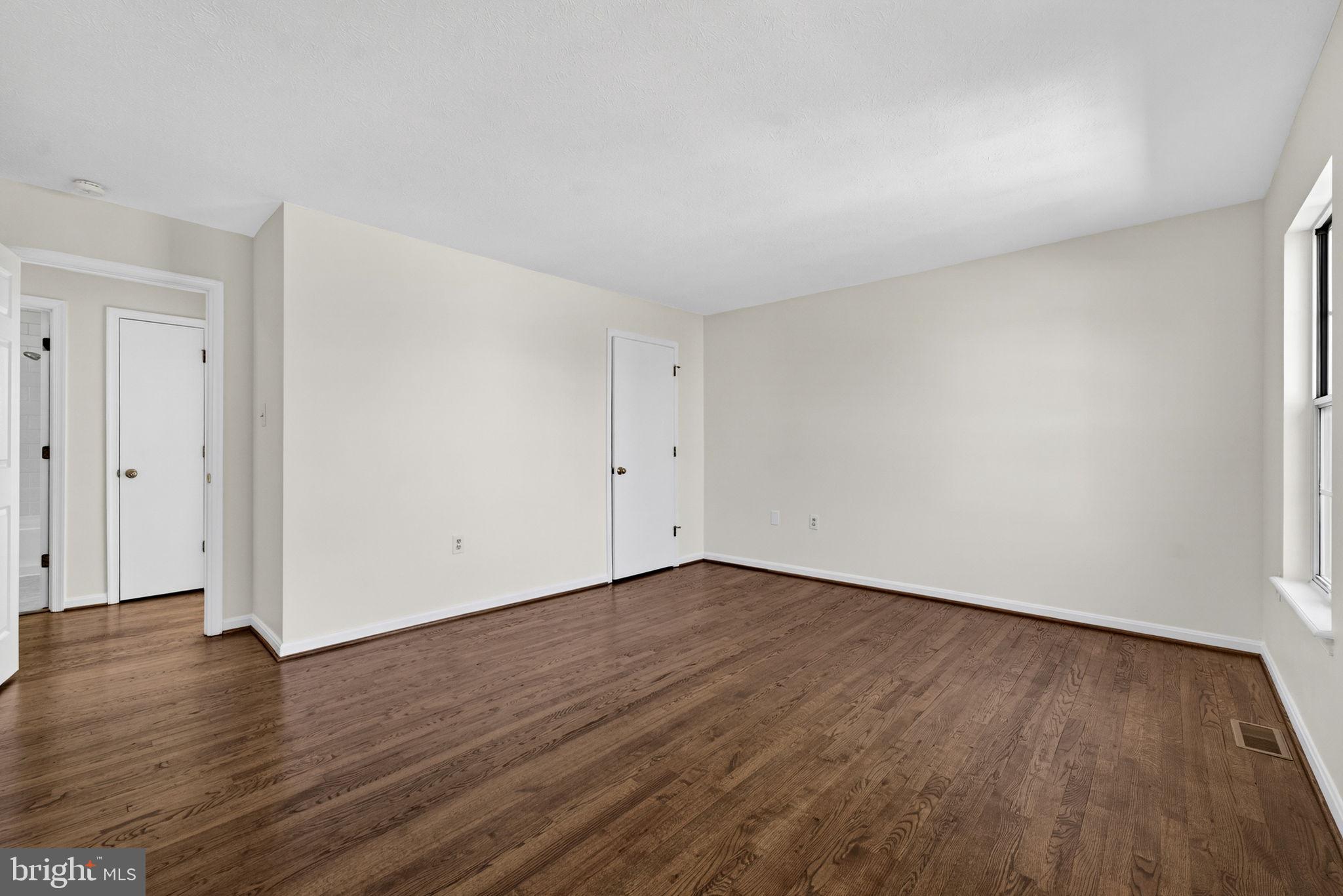 352 Valley Mill Road Winchester, VA 22602 - Photo 21 of 28 a view of an empty room with wooden floor