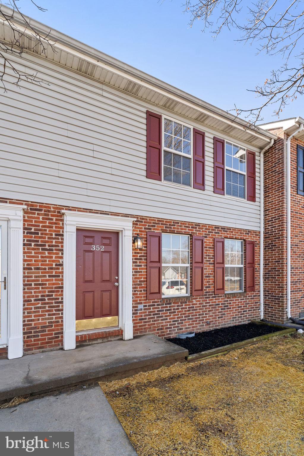 352 Valley Mill Road Winchester, VA 22602 - Photo 4 of 28 a view of a brick house with many windows