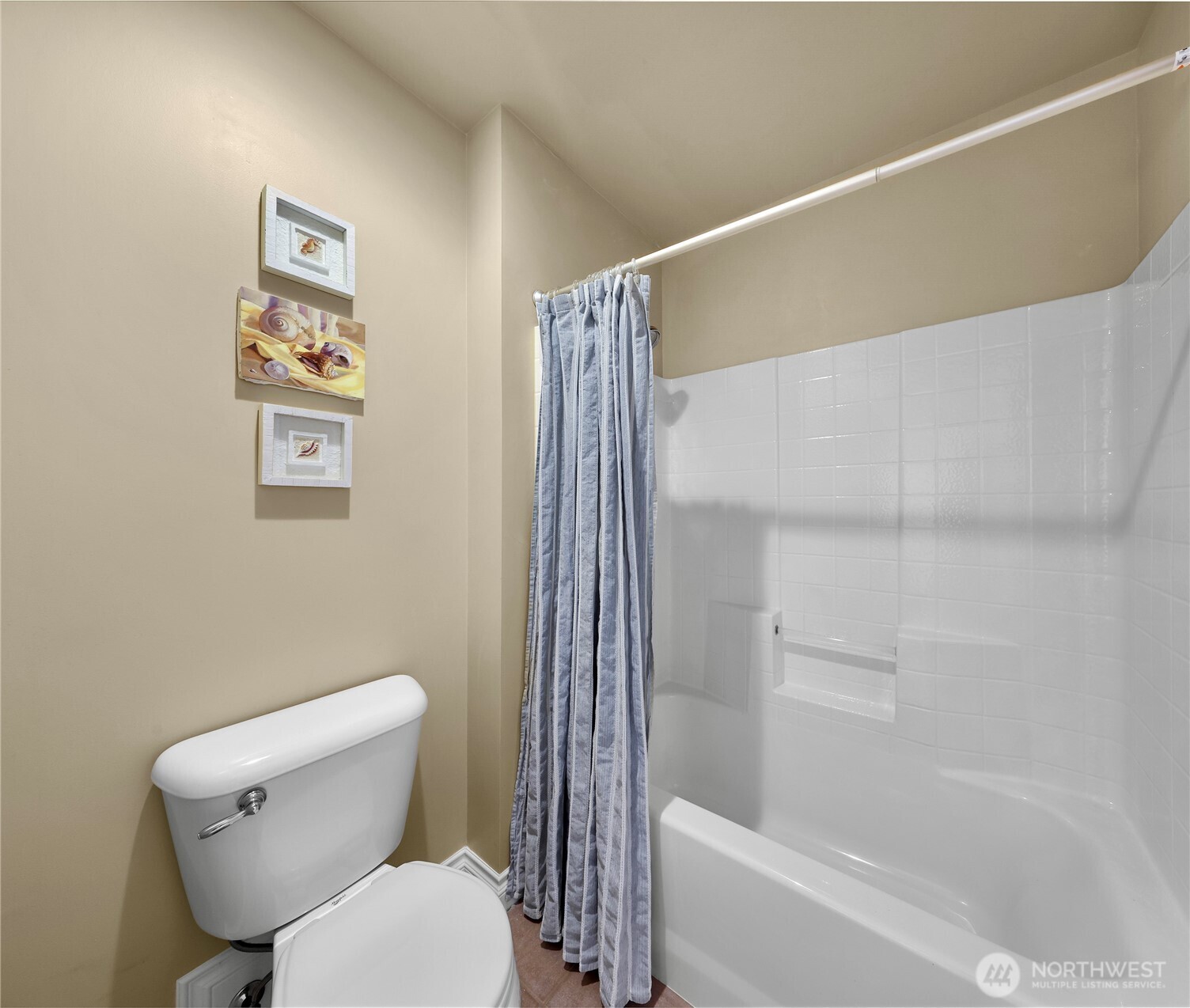 2029 240th Place Southeast Bothell, WA 98021 - Photo 28 of 39 a white toilet sitting next to a bath tub