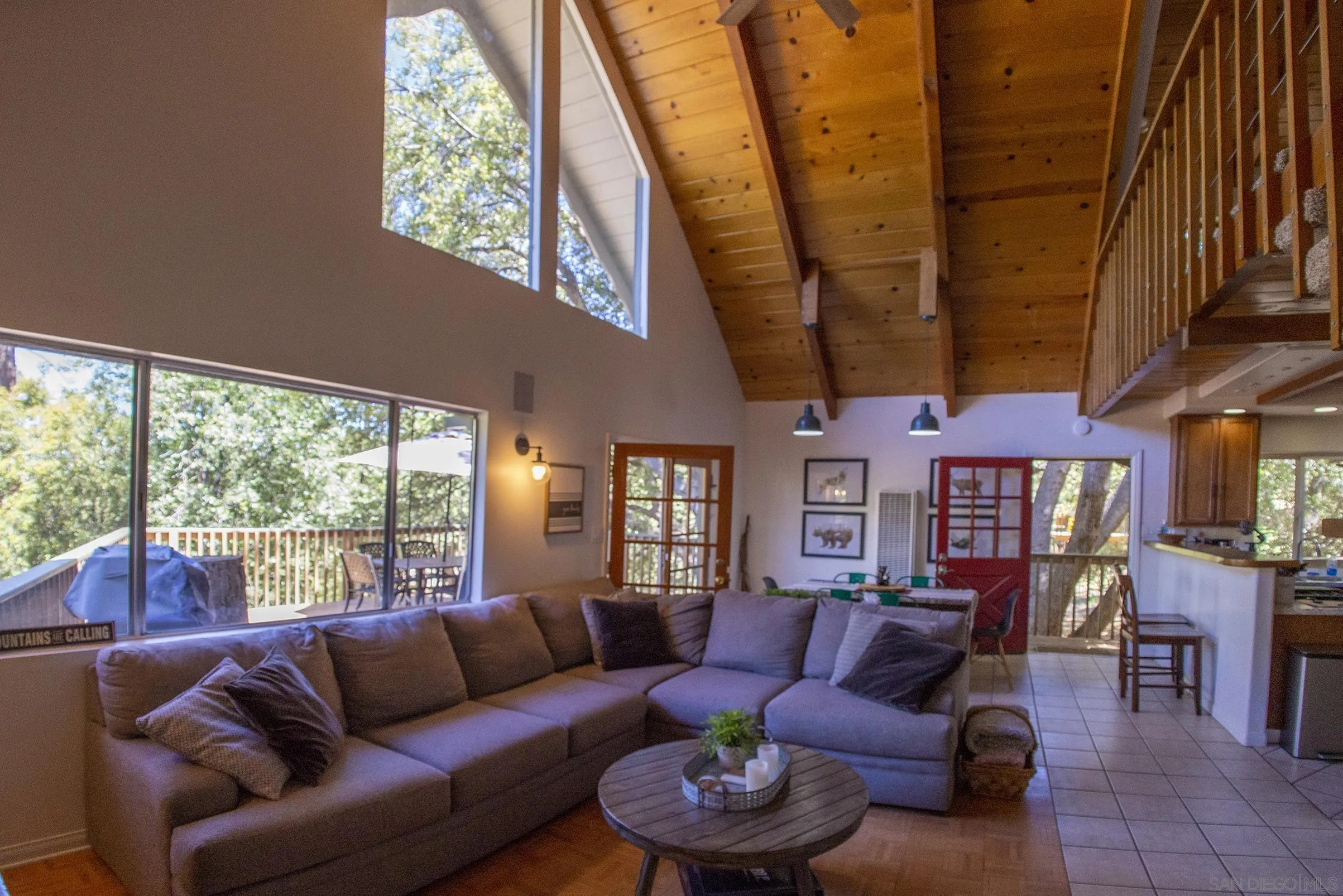 24735 Marion Ridge Drive Idyllwild, CA 92549 - Photo 1 of 29 a living room with furniture and a large window