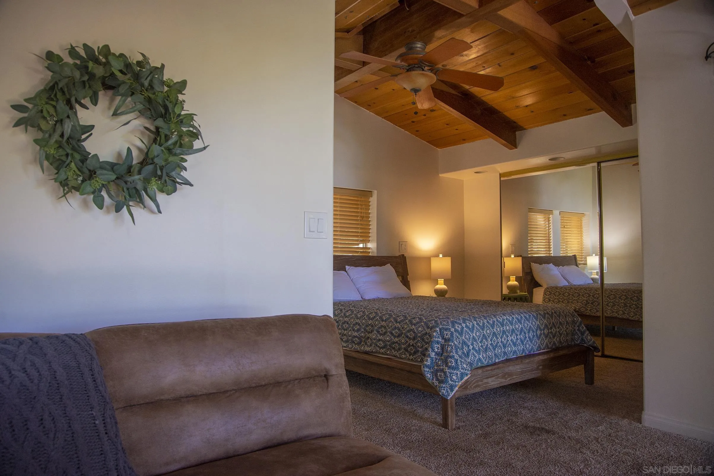 24735 Marion Ridge Drive Idyllwild, CA 92549 - Photo 19 of 29 a living room with furniture and a potted plant