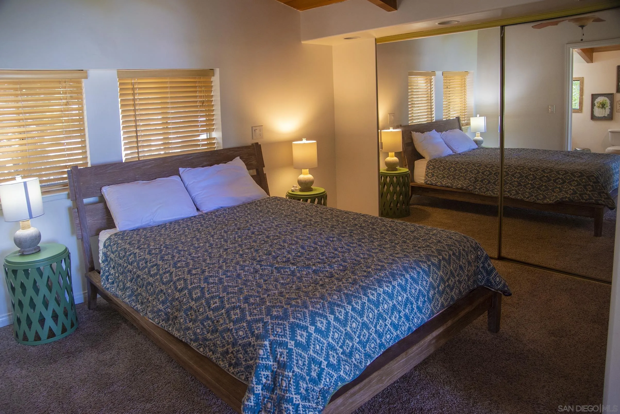 24735 Marion Ridge Drive Idyllwild, CA 92549 - Photo 20 of 29 a bedroom with a bed and window
