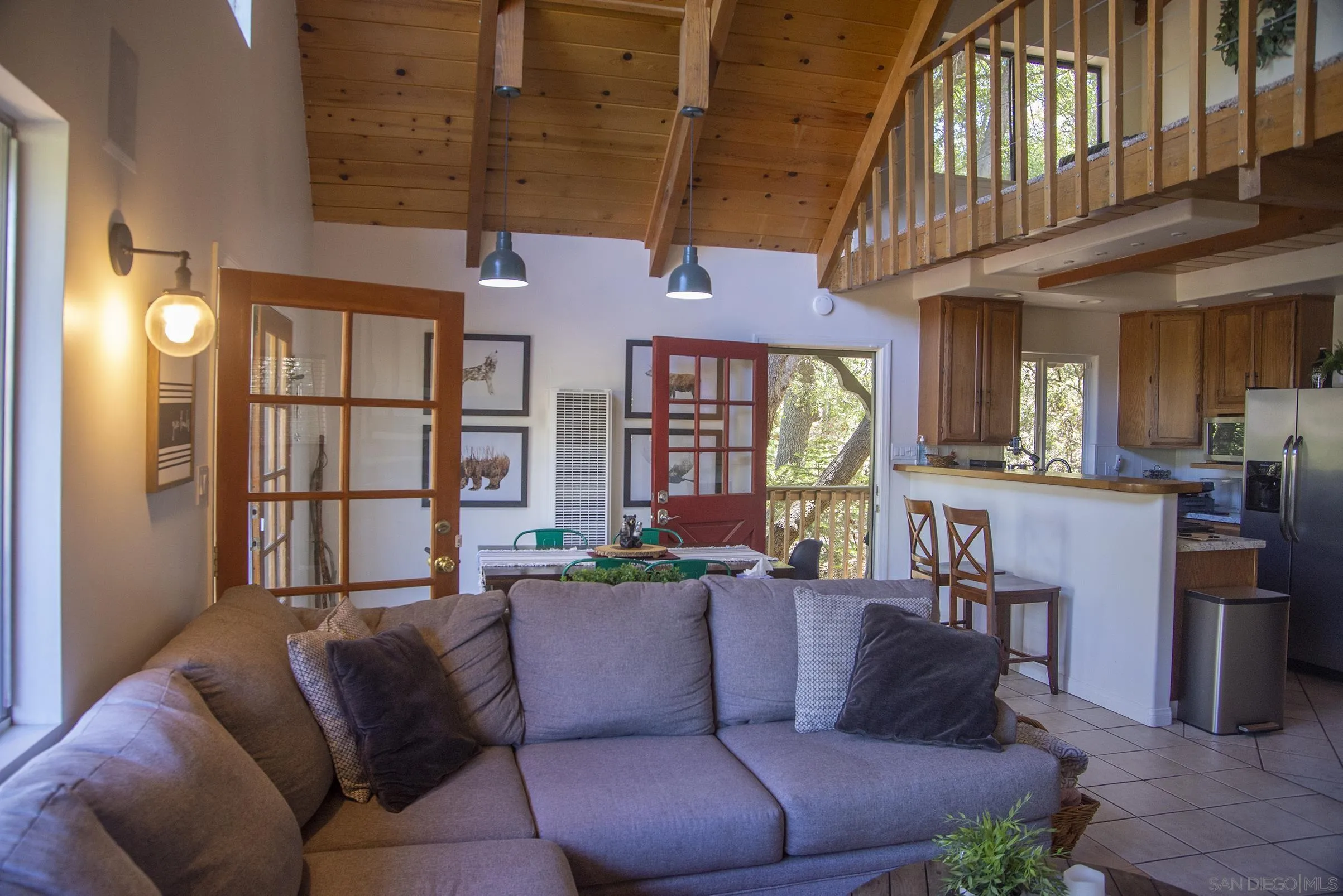 24735 Marion Ridge Drive Idyllwild, CA 92549 - Photo 6 of 29 a living room with furniture and a large window