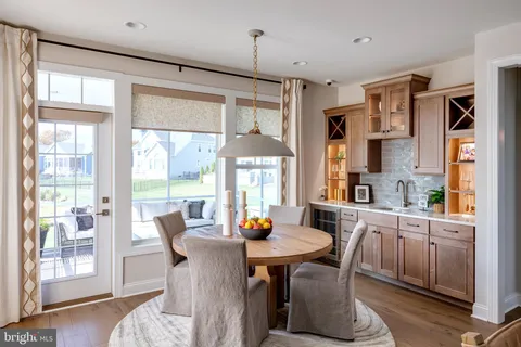 a very nice looking living room with furniture and a flat screen tv