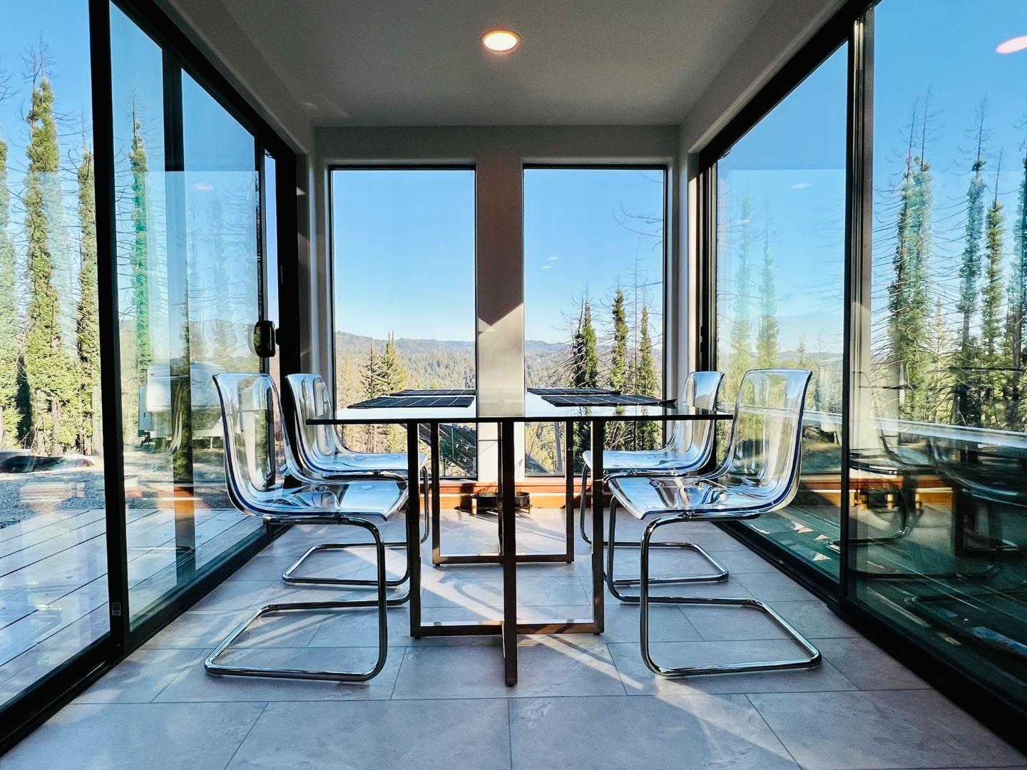 518 Container Way Boulder Creek, CA 95006 - Photo 5 of 33 a view of a balcony with chairs and wooden floor