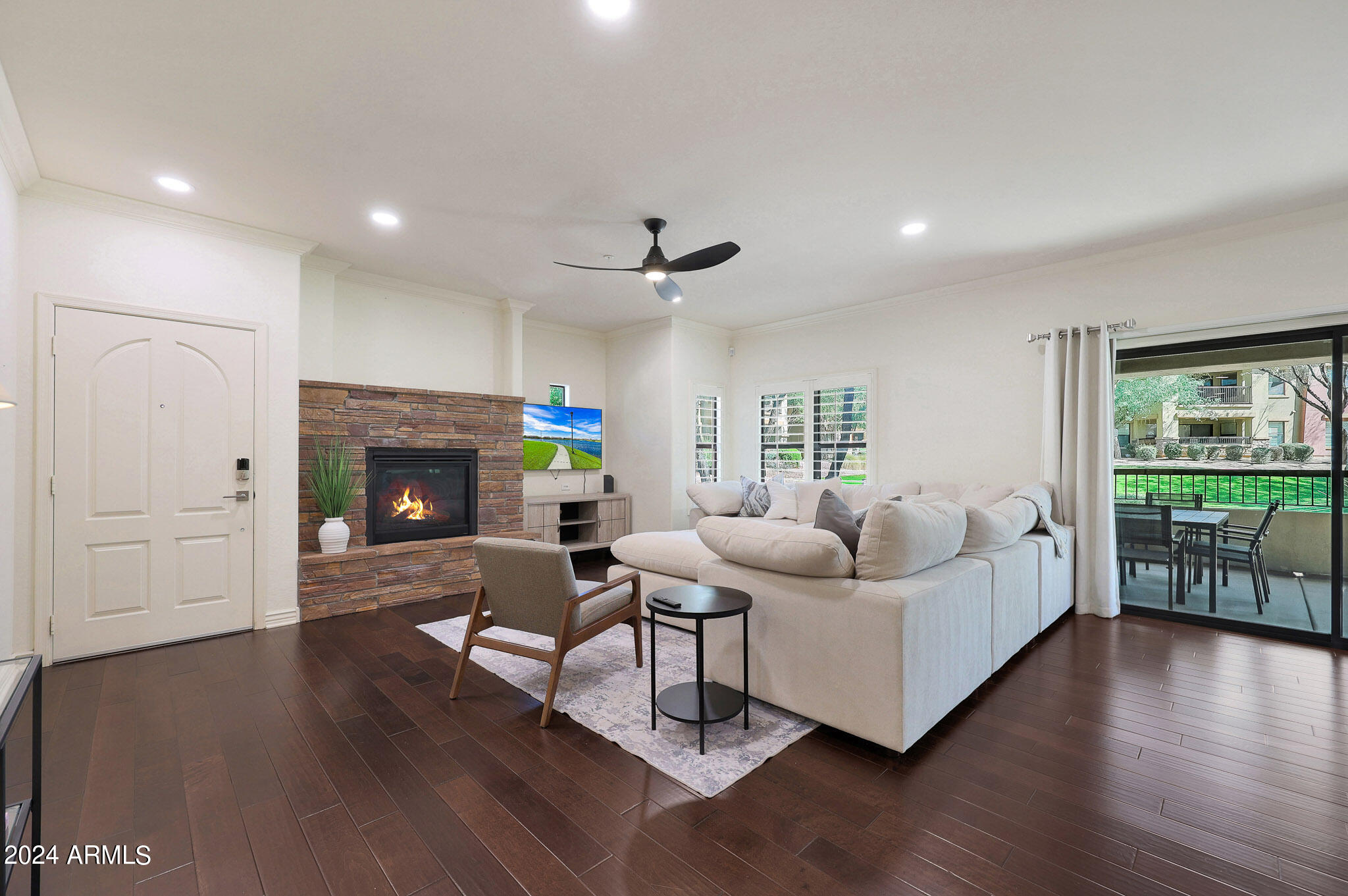 21320 North 56th Street, Unit 1148 Phoenix, AZ 85054 - Photo 4 of 44 Great Room w/ Fireplace