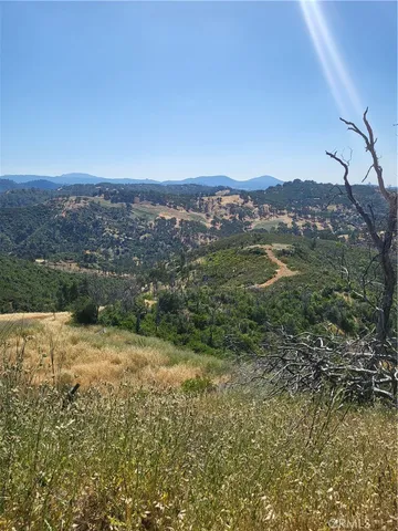 a view of a lake with a mountain in the background