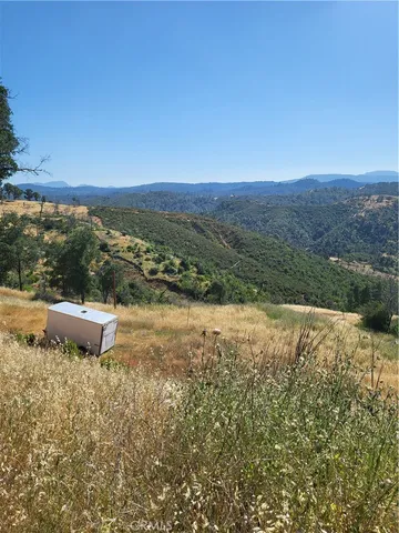 a view of an outdoor space with mountain view