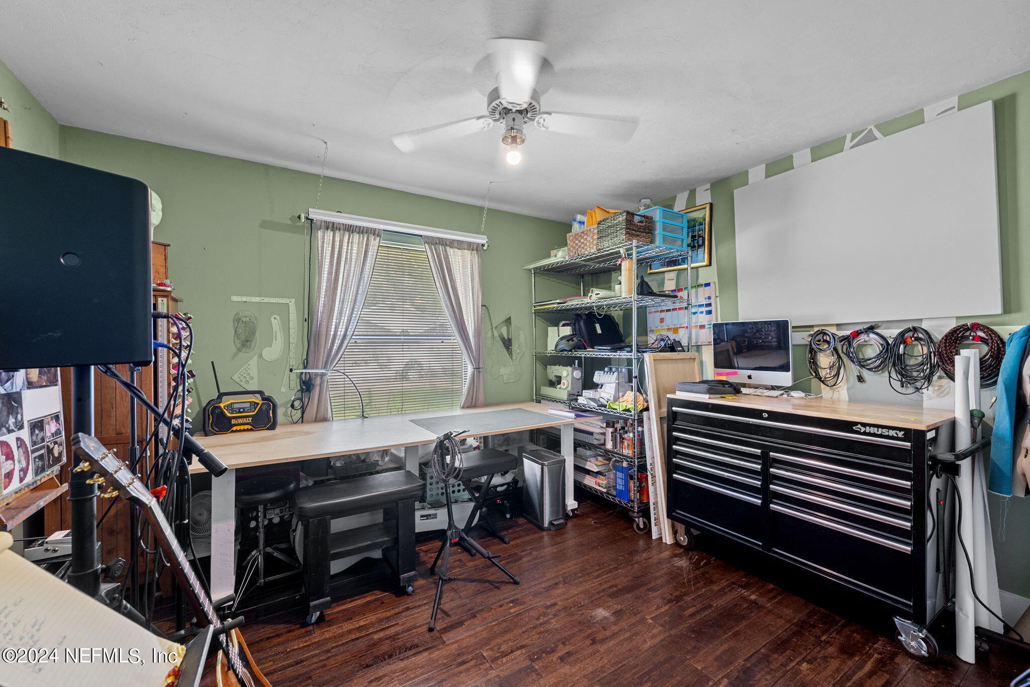 529 Fox Hollow Lane St. Augustine, FL 32086 - Photo 12 of 18 a room with furniture and wooden floor