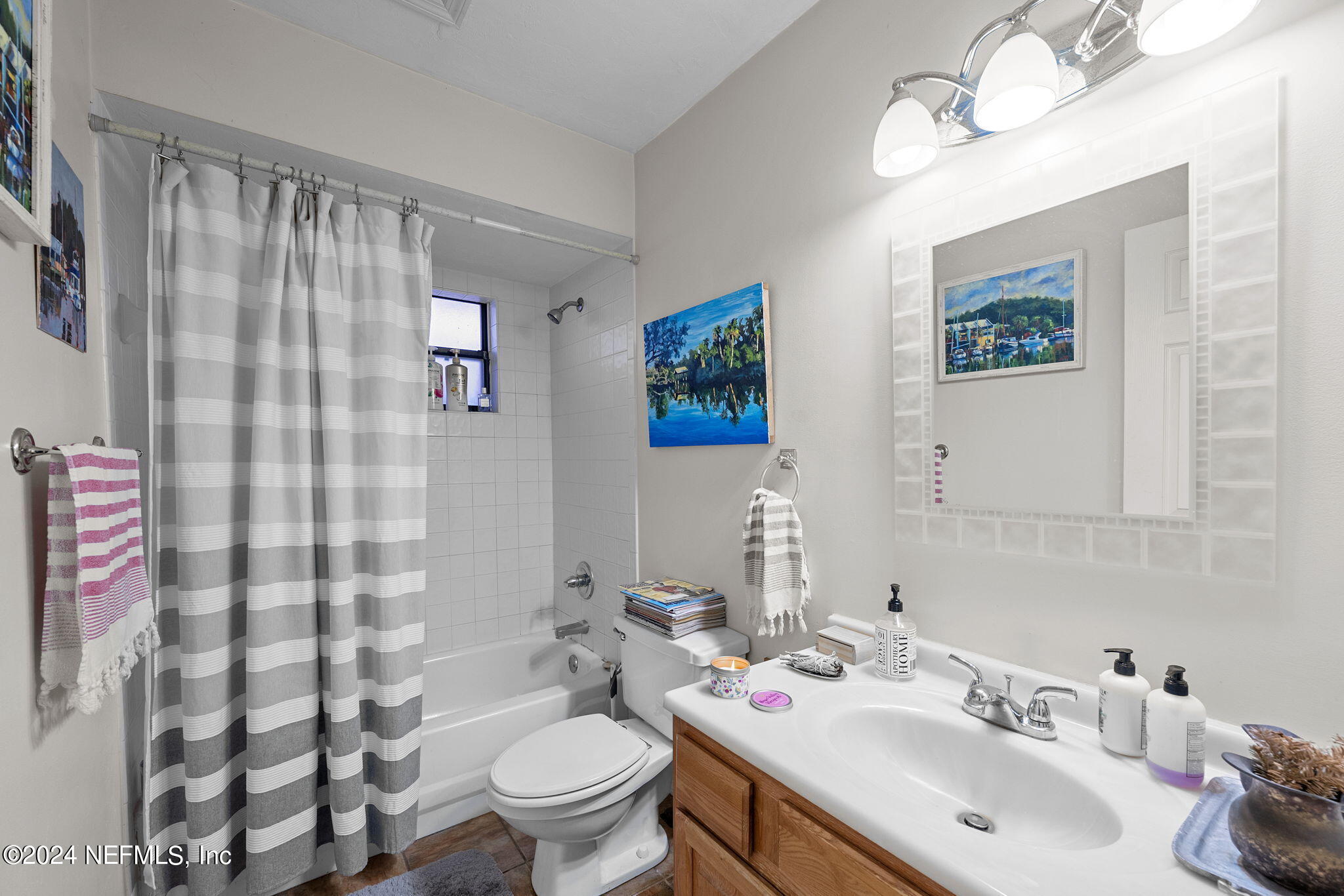 529 Fox Hollow Lane St. Augustine, FL 32086 - Photo 13 of 18 a bathroom with a sink toilet and shower