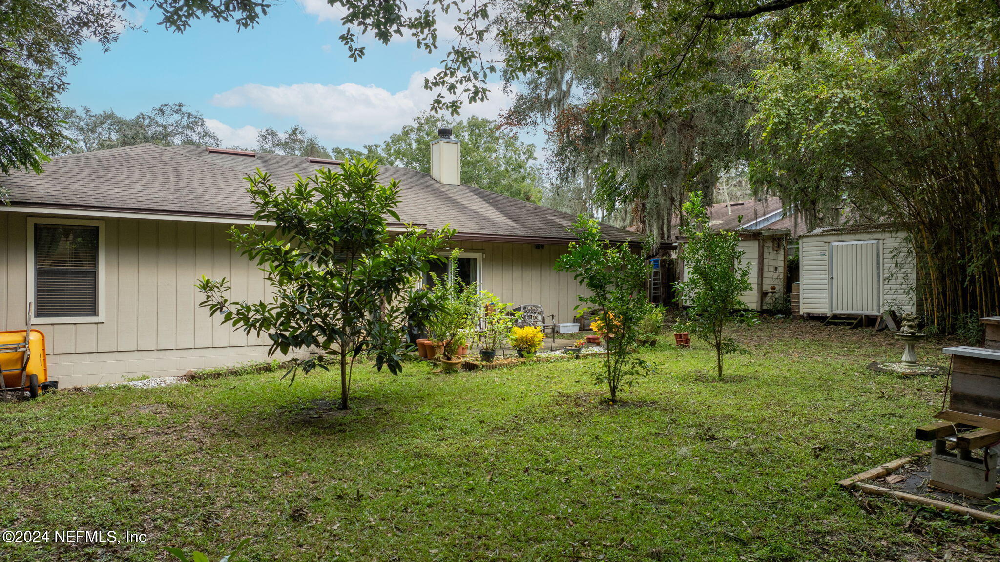 529 Fox Hollow Lane St. Augustine, FL 32086 - Photo 18 of 18 a view of a house with a yard