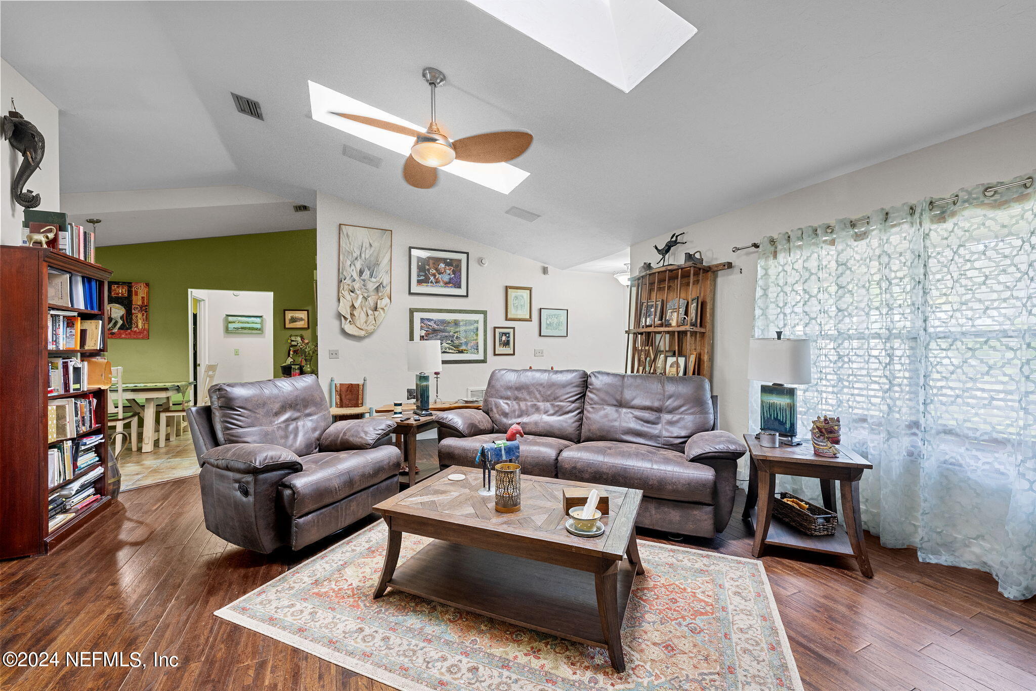529 Fox Hollow Lane St. Augustine, FL 32086 - Photo 5 of 18 a living room with furniture and a large window