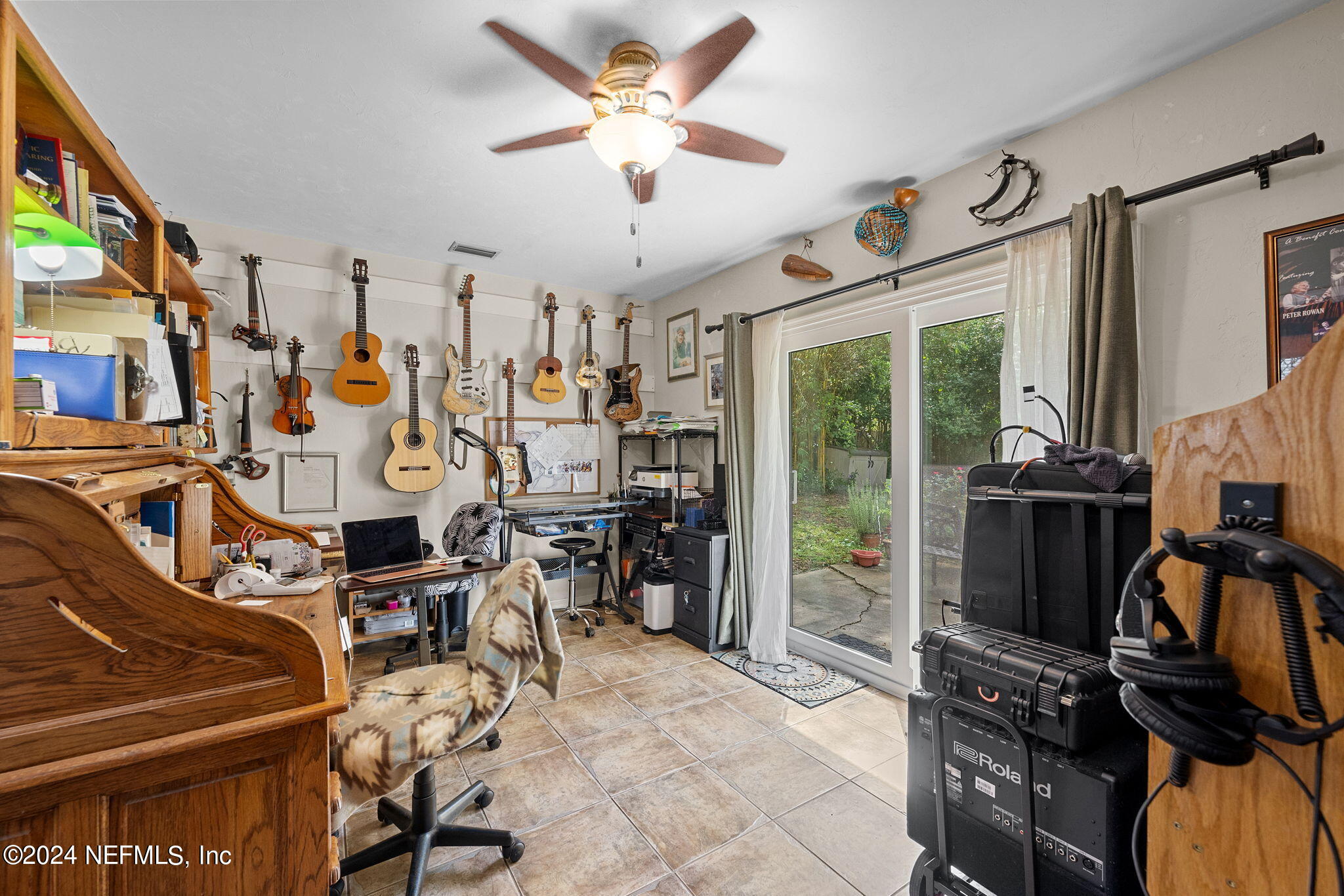 529 Fox Hollow Lane St. Augustine, FL 32086 - Photo 7 of 18 a view of a livingroom with furniture and a floor to ceiling window