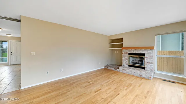 a view of a livingroom with a fireplace