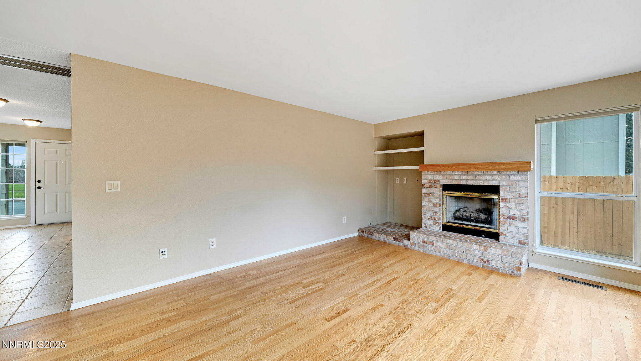 4690 Windcrest Drive Reno, NV 89523 - Photo 25 of 46 a view of a livingroom with a fireplace