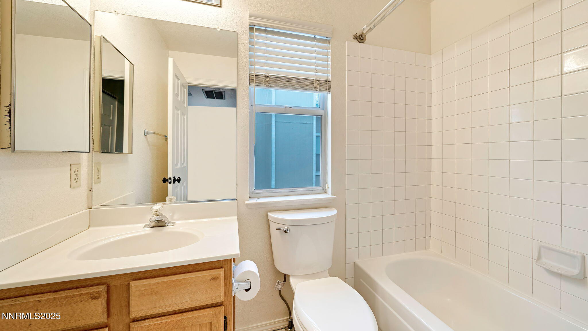 4690 Windcrest Drive Reno, NV 89523 - Photo 29 of 46 a bathroom with a sink a toilet and shower