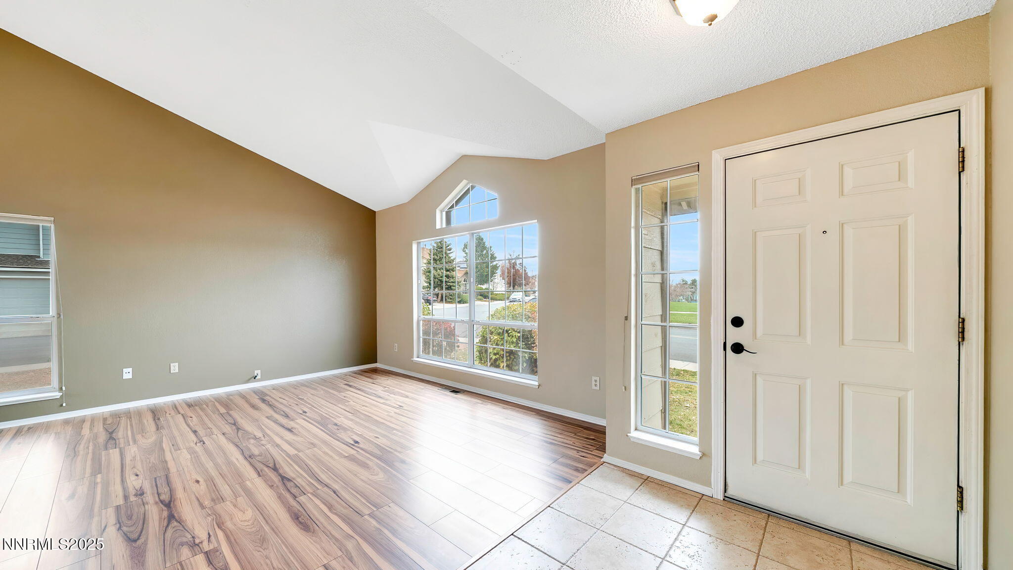 4690 Windcrest Drive Reno, NV 89523 - Photo 5 of 46 a view of an empty room with glass door