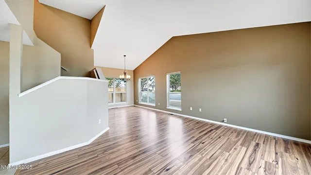 a view of livingroom with wooden floor