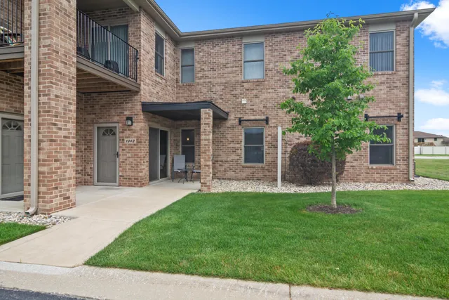 a house with a garden and pathway
