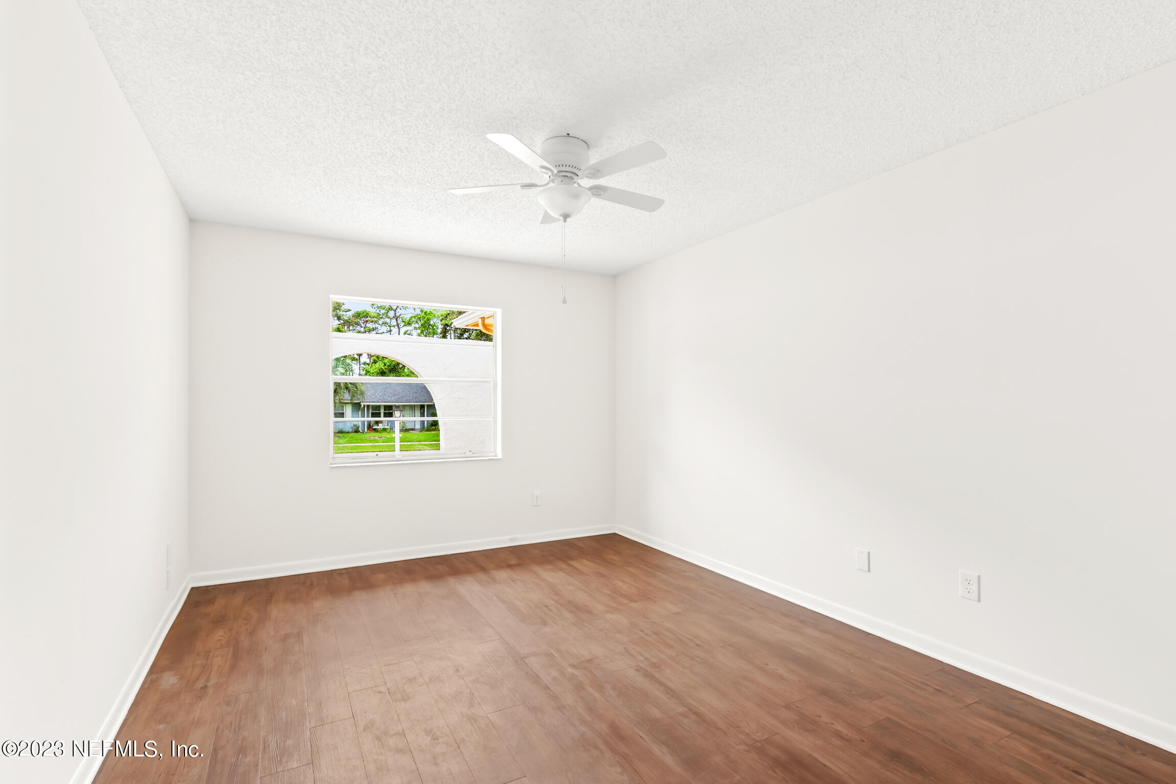 968 Espinado Avenue St. Augustine, FL 32086 - Photo 18 of 41 a view of an empty room with a window