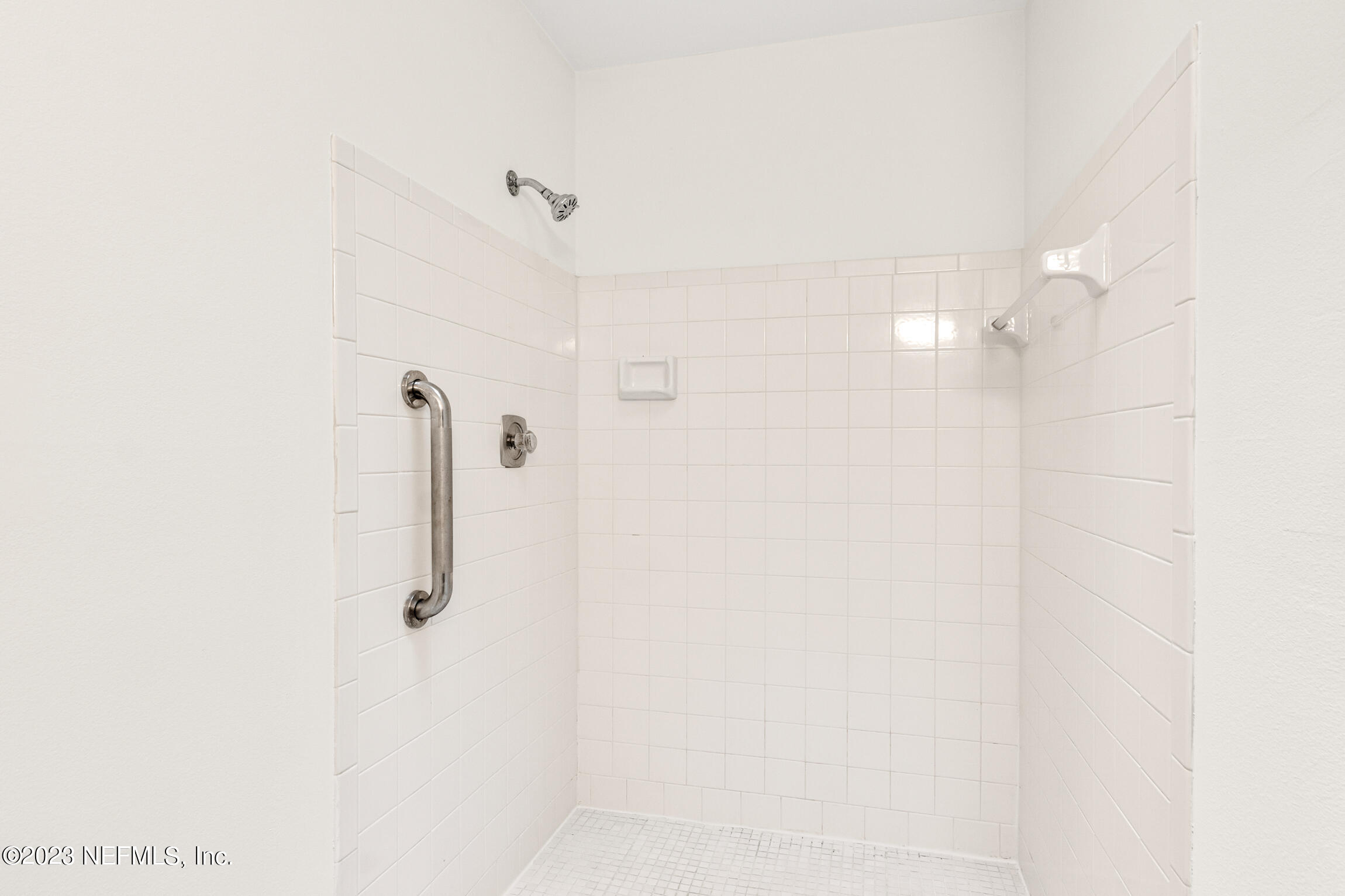 968 Espinado Avenue St. Augustine, FL 32086 - Photo 22 of 41 a bathroom with a shower