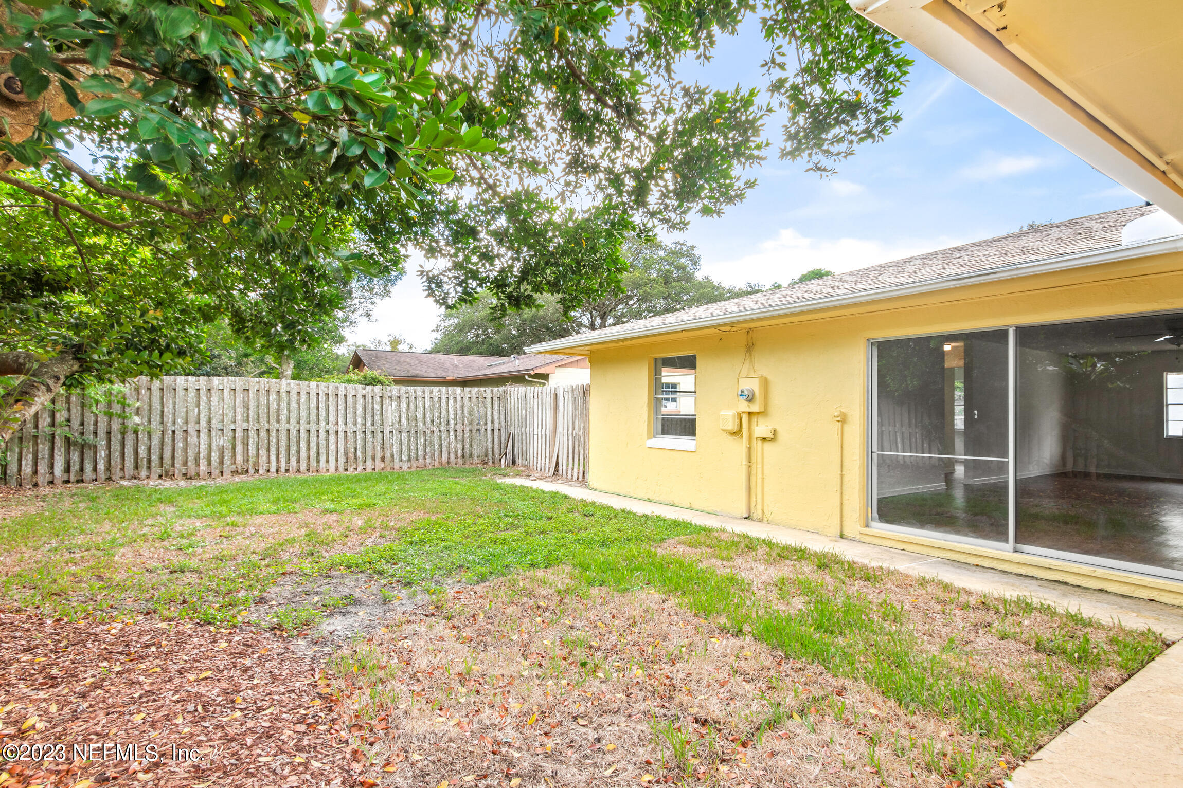 968 Espinado Avenue St. Augustine, FL 32086 - Photo 32 of 41 a view of a back yard of the house