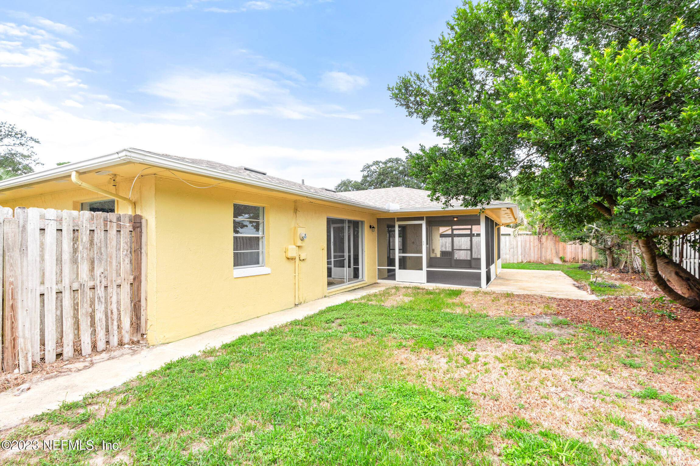 968 Espinado Avenue St. Augustine, FL 32086 - Photo 33 of 41 front view of a house with a yard